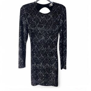 Like New, Divided Black and Silver Bodycon Cocktail Dress in a women’s Size M.